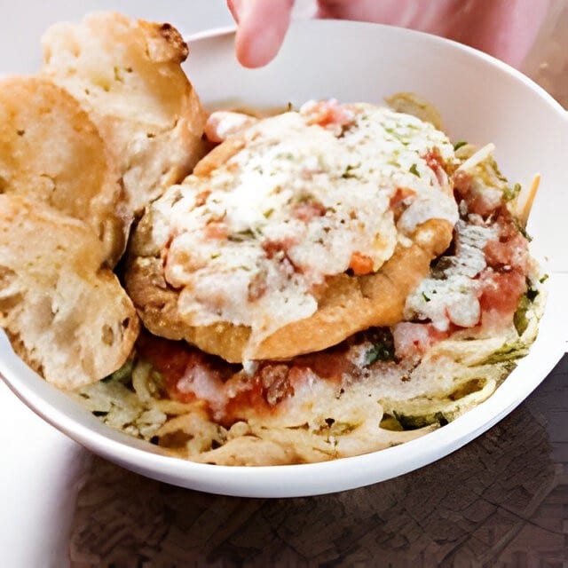 Breast of Chicken Parmigiana.